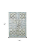 Homeroots 10' X 13' Blue Gray And Green Floral Power Loom Worn Faded Area Rug Blue Polypropylene 565705