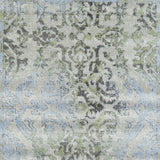 Homeroots 8' Blue Gray And Green Floral Power Loom Worn Faded Runner Rug Blue Polypropylene 565706