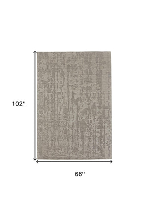 Homeroots 6' X 9' Taupe Abstract Hand Woven Area Rug Taupe Viscose 565726