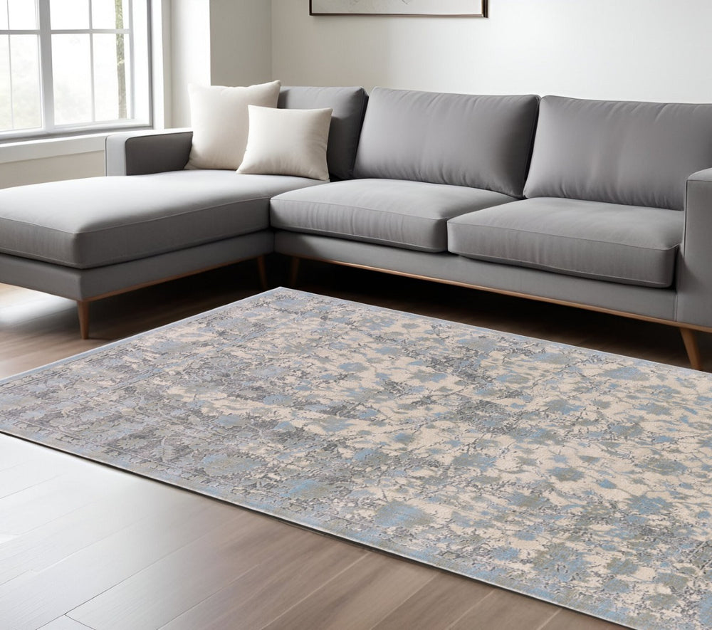 HomeRoots 10' Modern Ivory and Blue Abstract Area Rug – Plush, Faded Design for Family Spaces & Easy Care 10' X 13' 565729