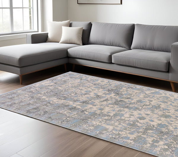 HomeRoots 10' Modern Ivory and Blue Abstract Area Rug – Plush, Faded Design for Family Spaces & Easy Care 10' X 13' 565729