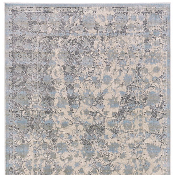 HomeRoots 10' Modern Ivory and Blue Abstract Area Rug – Plush, Faded Design for Family Spaces & Easy Care 10' X 13' 565729