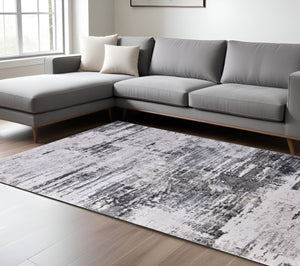 HomeRoots 5' Gray Ivory Taupe Abstract Area Rug - Contemporary Power Loomed Design for Stylish Living Spaces 8' X 11' 565737