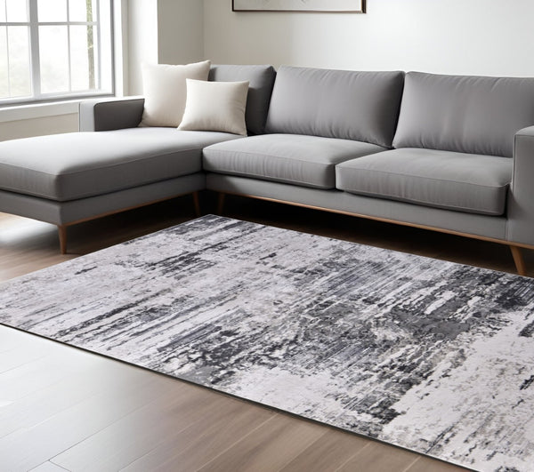 HomeRoots 5' Gray Ivory Taupe Abstract Area Rug - Contemporary Power Loomed Design for Stylish Living Spaces 8' X 11' 565737