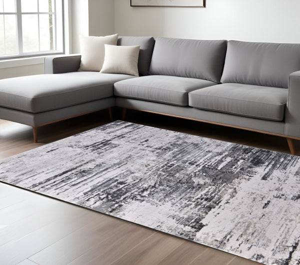 HomeRoots 5' Gray Ivory Taupe Abstract Area Rug - Contemporary Power Loomed Design for Stylish Living Spaces 10' X 13' 565738