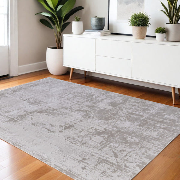 HomeRoots 5' Taupe and Silver Abstract Distressed Area Rug – Glamorous, Durable Design for Modern Interiors 5' X 8' 565740