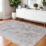 Homeroots 5' X 8' Taupe And Ivory Abstract Power Loom Worn Faded Area Rug Ivory Polypropylene 565740