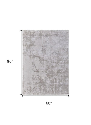 HomeRoots 5' Taupe and Silver Abstract Distressed Area Rug – Glamorous, Durable Design for Modern Interiors 5' X 8' 565740