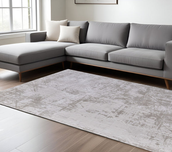 HomeRoots 5' Taupe and Silver Abstract Distressed Area Rug – Glamorous, Durable Design for Modern Interiors 10' X 13' 565742