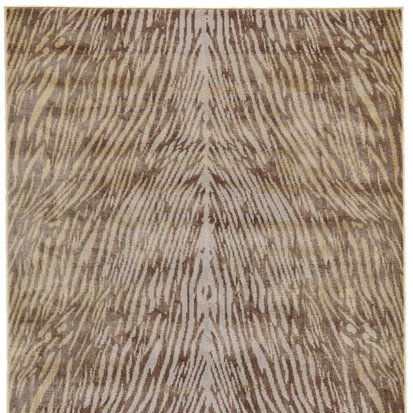 Homeroots 10' X 13' Brown And Tan Animal Print Power Loom Area Rug Brown Polypropylene 565752