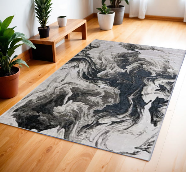 HomeRoots 4' Modern Abstract Area Rug in Ivory, Black & Taupe – Durable, Soft, Stain-Resistant for High-Traffic Areas 4' X 6' 565793