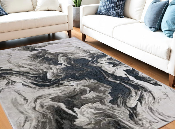 HomeRoots 4' Modern Abstract Area Rug in Ivory, Black & Taupe – Durable, Soft, Stain-Resistant for High-Traffic Areas 5' X 8' 565794