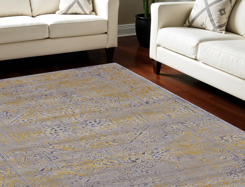 Homeroots 7' X 10' Gray And Gold Oriental Power Loom Worn Faded Area Rug Gray Polypropylene 565855