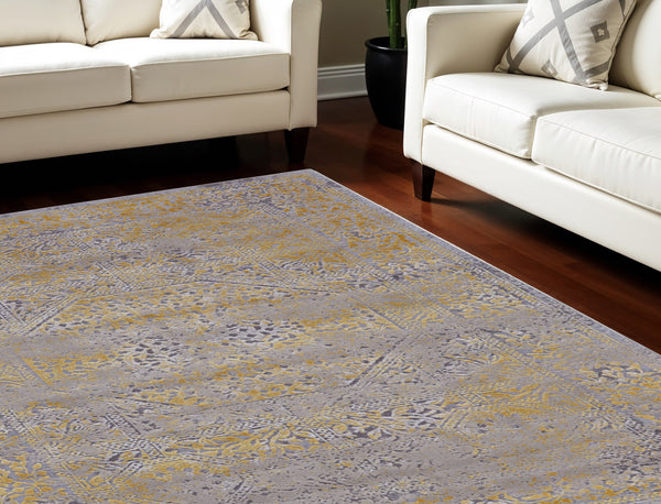 Homeroots 10' X 13' Gray And Gold Oriental Power Loom Worn Faded Area Rug Gray Polypropylene 565856