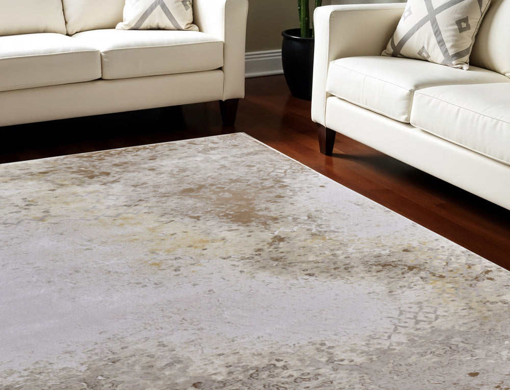 Homeroots 8' X 11' Tan And Ivory Abstract Power Loom Worn Faded Area Rug Brown Polypropylene 565866