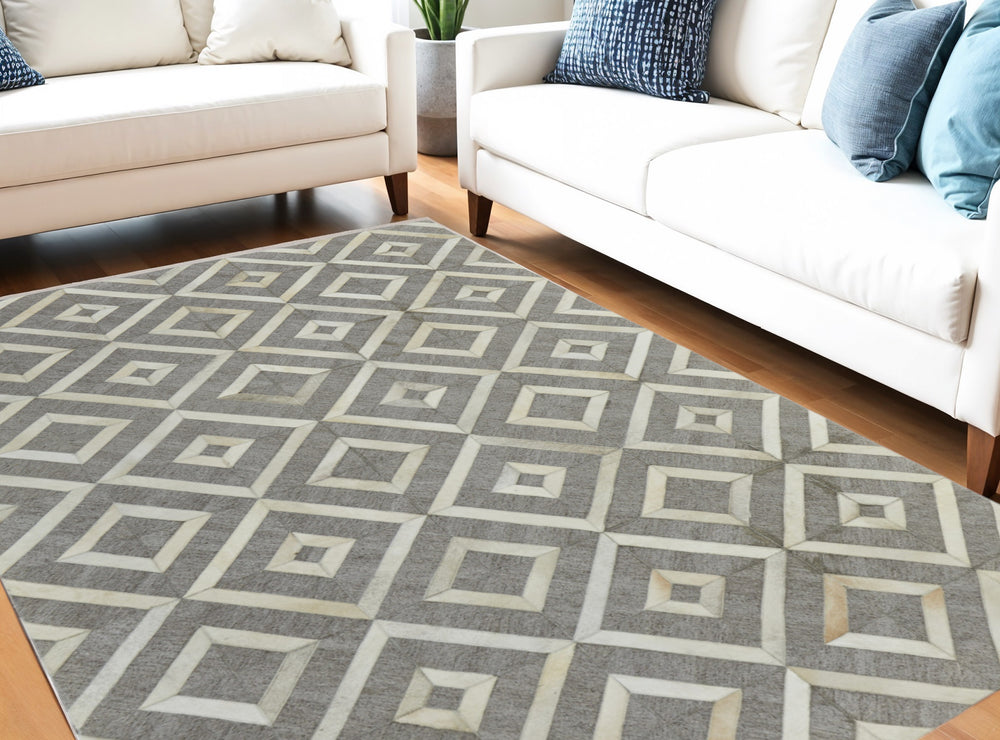 Homeroots 5' X 8' Tan And Ivory Geometric Hand Woven Area Rug Taupe Viscose 565877
