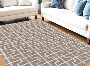 Homeroots 5' X 8' Tan And Ivory Geometric Hand Woven Area Rug Brown Viscose 565879