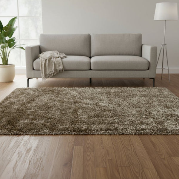 HomeRoots 5' Gold Shag Hand-Tufted Area Rug - Luxurious Retro Design, Soft Plush Feel, Stain-Resistant Durability 5' X 8' 565914