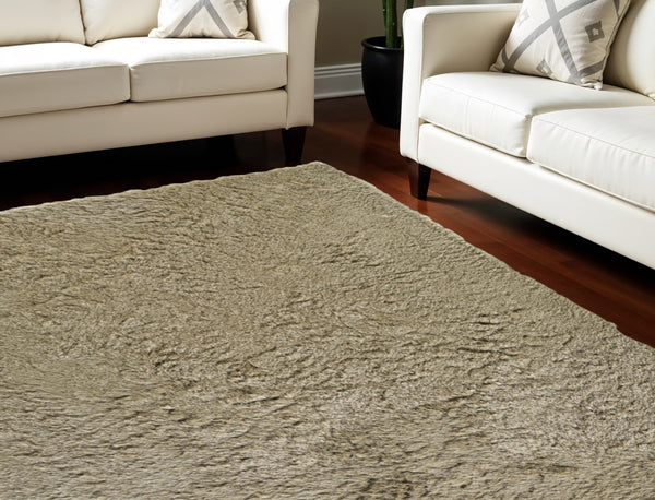HomeRoots 5' Tan Shag Hand-Tufted Area Rug - Luxurious Soft Texture for Modern & Traditional Home Decor 7' X 10' 565917