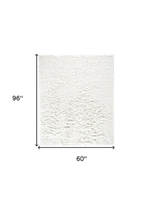 HomeRoots 5' Tan Shag Hand-Tufted Area Rug - Luxurious Soft Texture for Modern & Traditional Home Decor 5' X 8' 565921