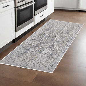 Homeroots 5' X 7' Blue White And Gray Oriental Power Loom Worn Faded Area Rug White Polypropylene 565936