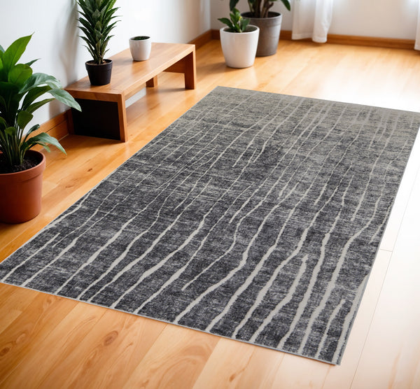 Homeroots 4' X 6' Ivory Gray And Black Abstract Power Loom Area Rug Black Polypropylene 565964