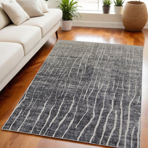 Homeroots 5' X 8' Ivory Gray And Black Abstract Power Loom Area Rug Black Polypropylene 565965