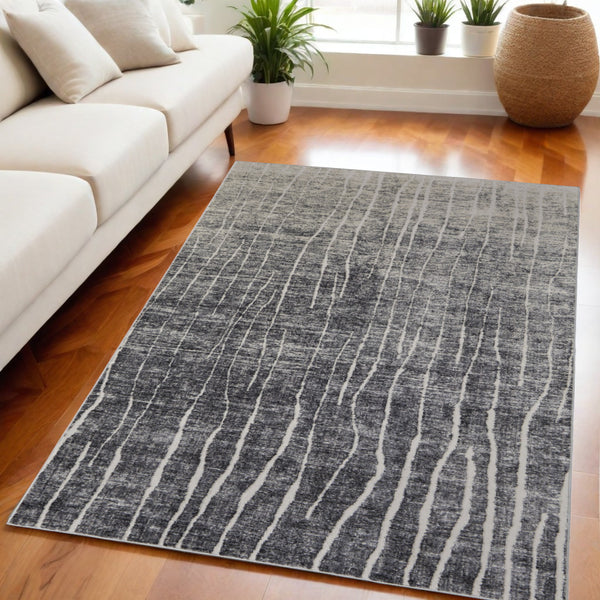 Homeroots 5' X 8' Ivory Gray And Black Abstract Power Loom Area Rug Black Polypropylene 565965