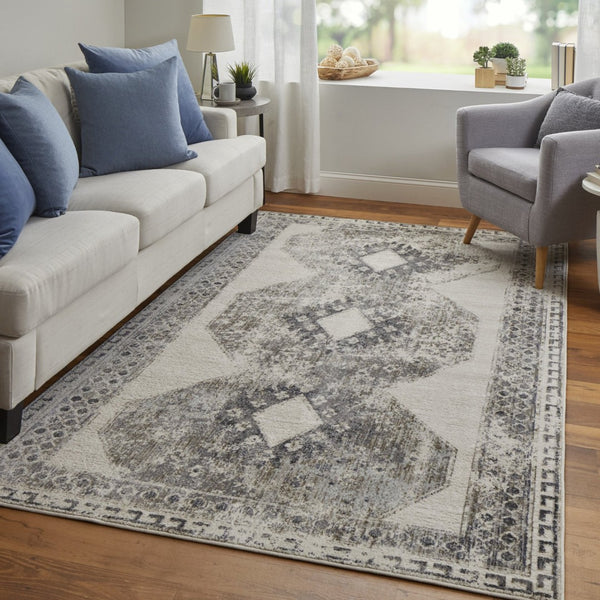 HomeRoots 4' Gray and Ivory Abstract Area Rug - Stylish Power-Loomed Design for Modern and Transitional Spaces 5' X 8' 565971