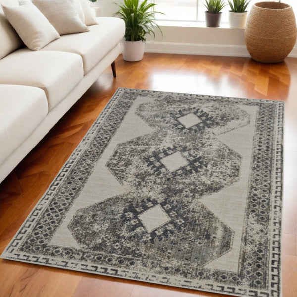 HomeRoots 4' Gray and Ivory Abstract Area Rug - Stylish Power-Loomed Design for Modern and Transitional Spaces 5' X 8' 565971