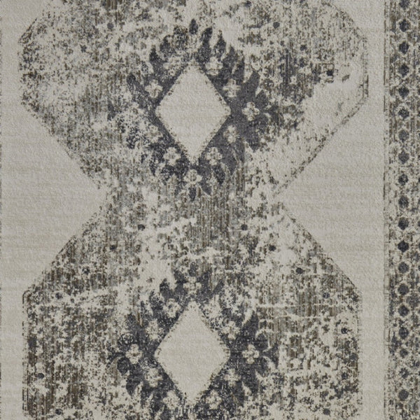 HomeRoots 4' Gray and Ivory Abstract Area Rug - Stylish Power-Loomed Design for Modern and Transitional Spaces 5' X 8' 565971