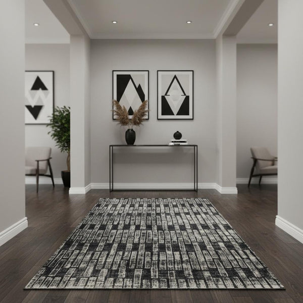 HomeRoots 4' Gray and Black Geometric Area Rug - Modern Power Loom Design with Worn-Faded Look for Homes 4' X 6' 565976