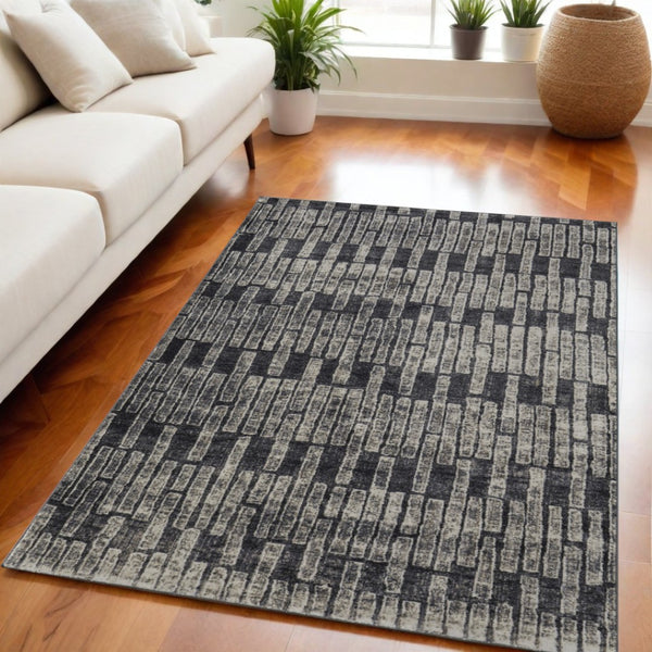 HomeRoots 4' Gray and Black Geometric Area Rug - Modern Power Loom Design with Worn-Faded Look for Homes 5' X 8' 565977