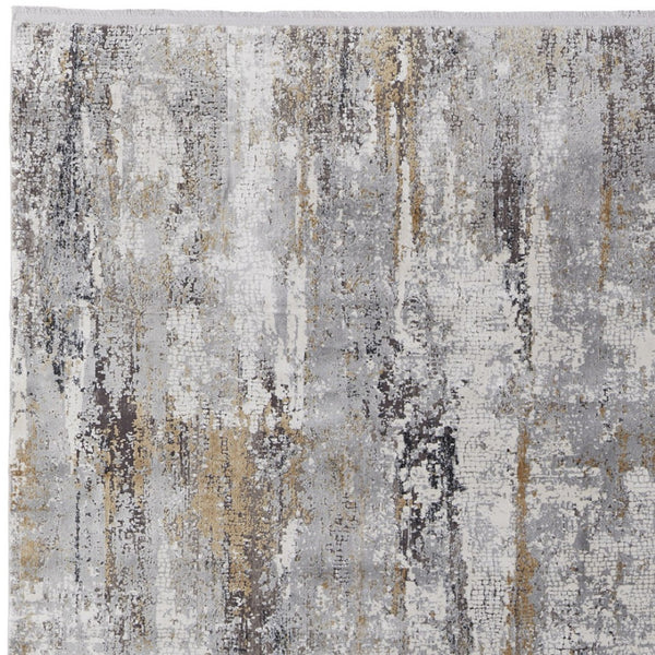 HomeRoots 3' Modern Gray Ivory Gold Abstract Power Loomed Area Rug with Fringed Edges for Stylish Spaces 7' X 10' 565994