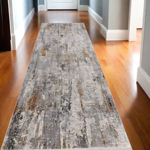 HomeRoots 3' Modern Gray Ivory Gold Abstract Power Loomed Area Rug with Fringed Edges for Stylish Spaces 10' Runner 565997