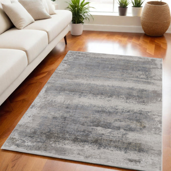 Homeroots 5' X 8' Gray Abstract Power Loom Area Rug With Fringe Taupe Viscose 566003