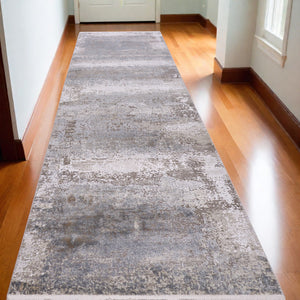 Homeroots 10' Gray Abstract Power Loom Runner Rug With Fringe Taupe Viscose 566007