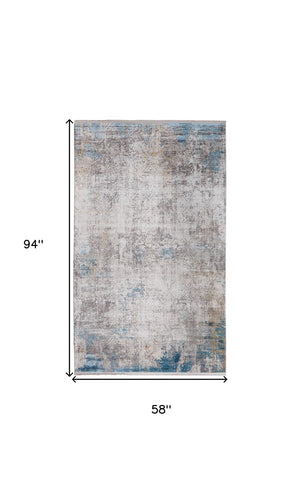 HomeRoots 3' Modern Abstract Ivory Gray and Blue Power Loom Area Rug with Tasseled Edges for Style & Comfort 5' X 8' 566013