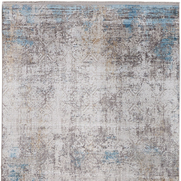 HomeRoots 3' Modern Abstract Ivory Gray and Blue Power Loom Area Rug with Tasseled Edges for Style & Comfort 7' X 10' 566014