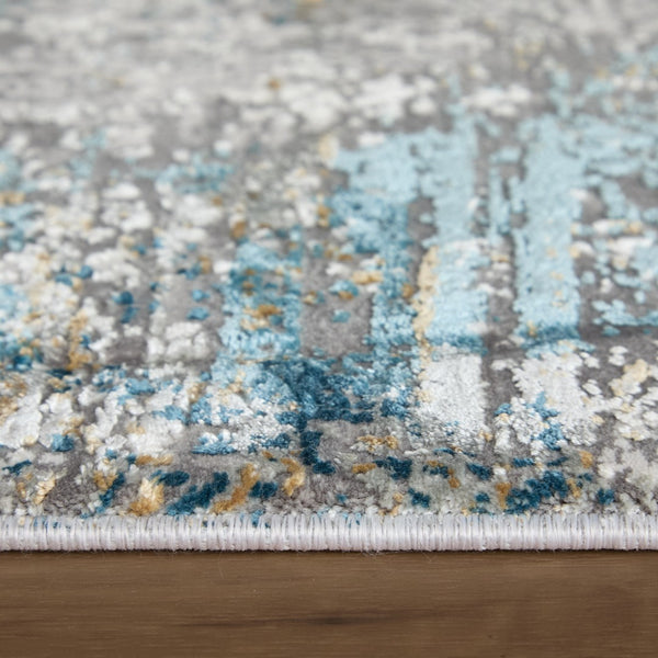 HomeRoots 3' Modern Abstract Ivory Gray and Blue Power Loom Area Rug with Tasseled Edges for Style & Comfort 7' X 10' 566014