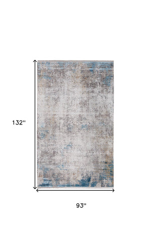 HomeRoots 3' Modern Abstract Ivory Gray and Blue Power Loom Area Rug with Tasseled Edges for Style & Comfort 8' X 11' 566015
