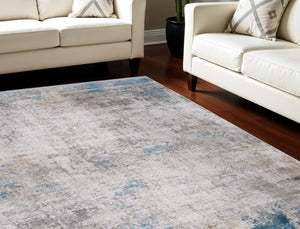 HomeRoots 3' Modern Abstract Ivory Gray and Blue Power Loom Area Rug with Tasseled Edges for Style & Comfort 13' X 20' 566019