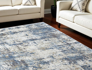 HomeRoots 3' Elevate Your Space with a Stylish Ivory Tan and Blue Abstract Power Loom Area Rug with Fringe 7' X 10' 566034