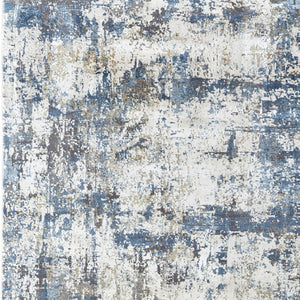 HomeRoots 3' Elevate Your Space with a Stylish Ivory Tan and Blue Abstract Power Loom Area Rug with Fringe 10' X 13' 566036