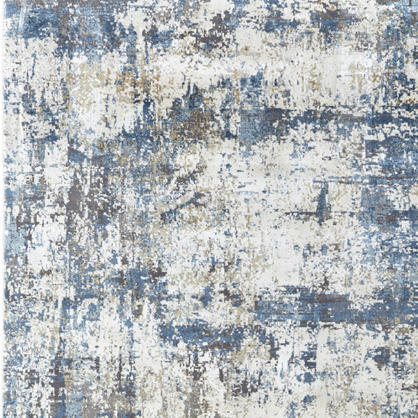 HomeRoots 3' Elevate Your Space with a Stylish Ivory Tan and Blue Abstract Power Loom Area Rug with Fringe 10' X 13' 566036