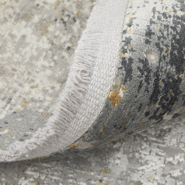 HomeRoots 3' Ivory Taupe and Gray Abstract Power Loom Distressed Area Rug with Tasseled Fringe Elegance 3' X 5' 566042