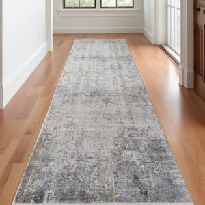 HomeRoots 3' Ivory Taupe and Gray Abstract Power Loom Distressed Area Rug with Tasseled Fringe Elegance 10' Runner 566047