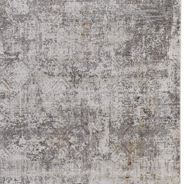 HomeRoots 3' Ivory Taupe and Gray Abstract Power Loom Distressed Area Rug with Tasseled Fringe Elegance 2' X 3' 566051