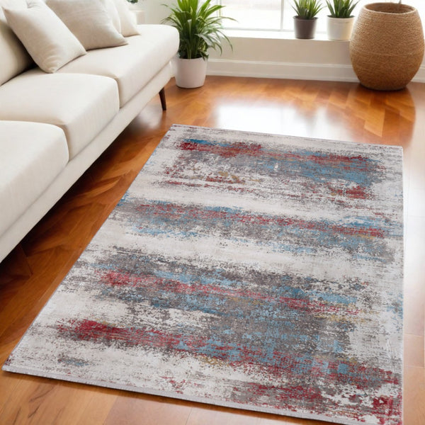 HomeRoots 3' Modern Abstract Area Rug in Gray, Blue, and Red with Fringed Edges for Cozy Home Decor 5' X 8' 566053