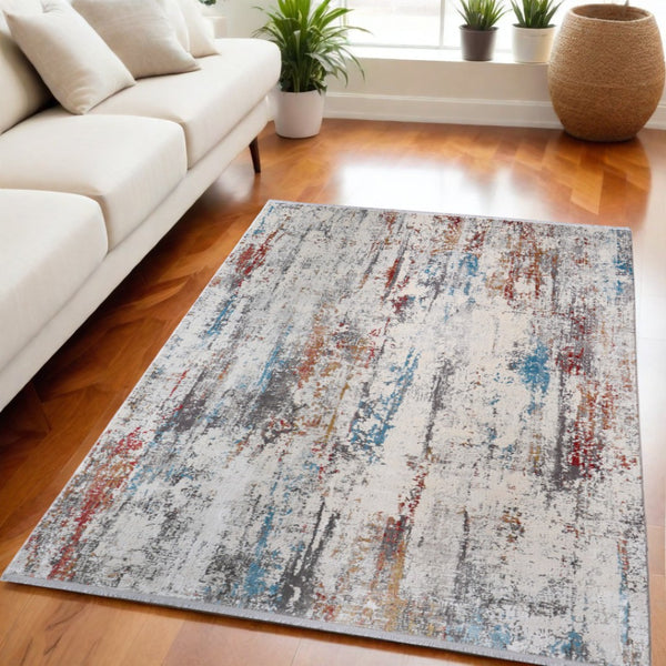 HomeRoots 3' Gray Blue and Red Abstract Power Loom Area Rug with Tassels - Elevate Your Space Instantly! 5' X 8' 566063